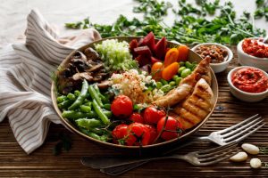 PCOS in teenage girls — healthy Mediterranean-style meal with whole grains, vegetables and protein